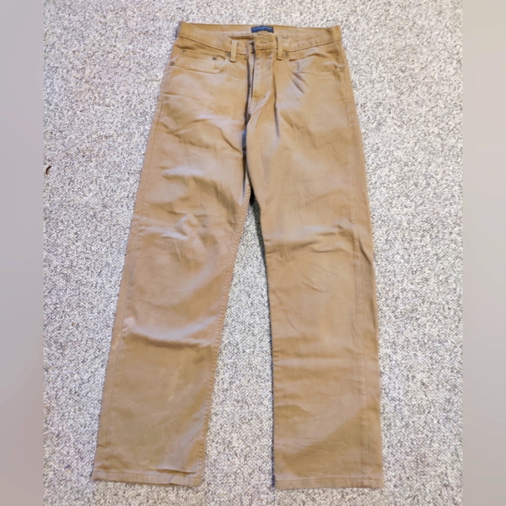 Rugged high waisted soft cotton tan jeans. Like new. Great for hiking outdoors.